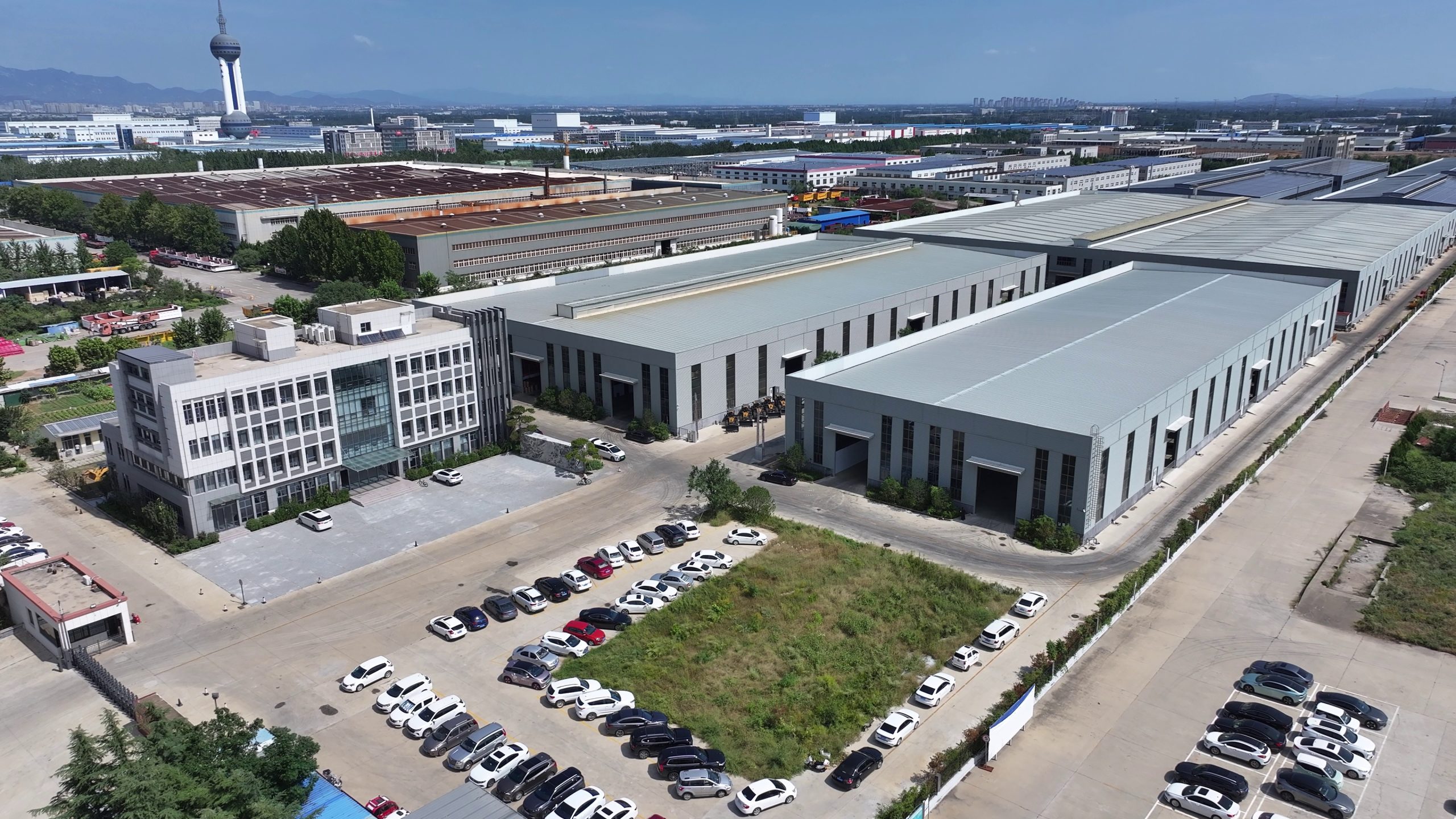 Aerial view of industrial buildings and an office building